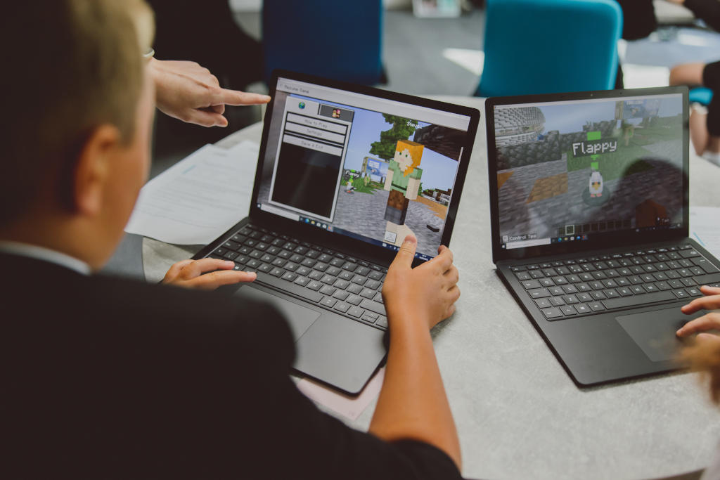 Students working on a laptop